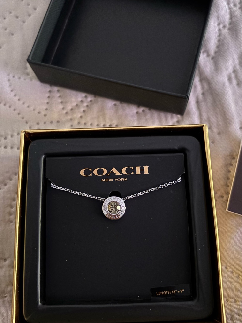 Coach Silver-Tone Round Logo Pendant Necklace with Crystal Accent